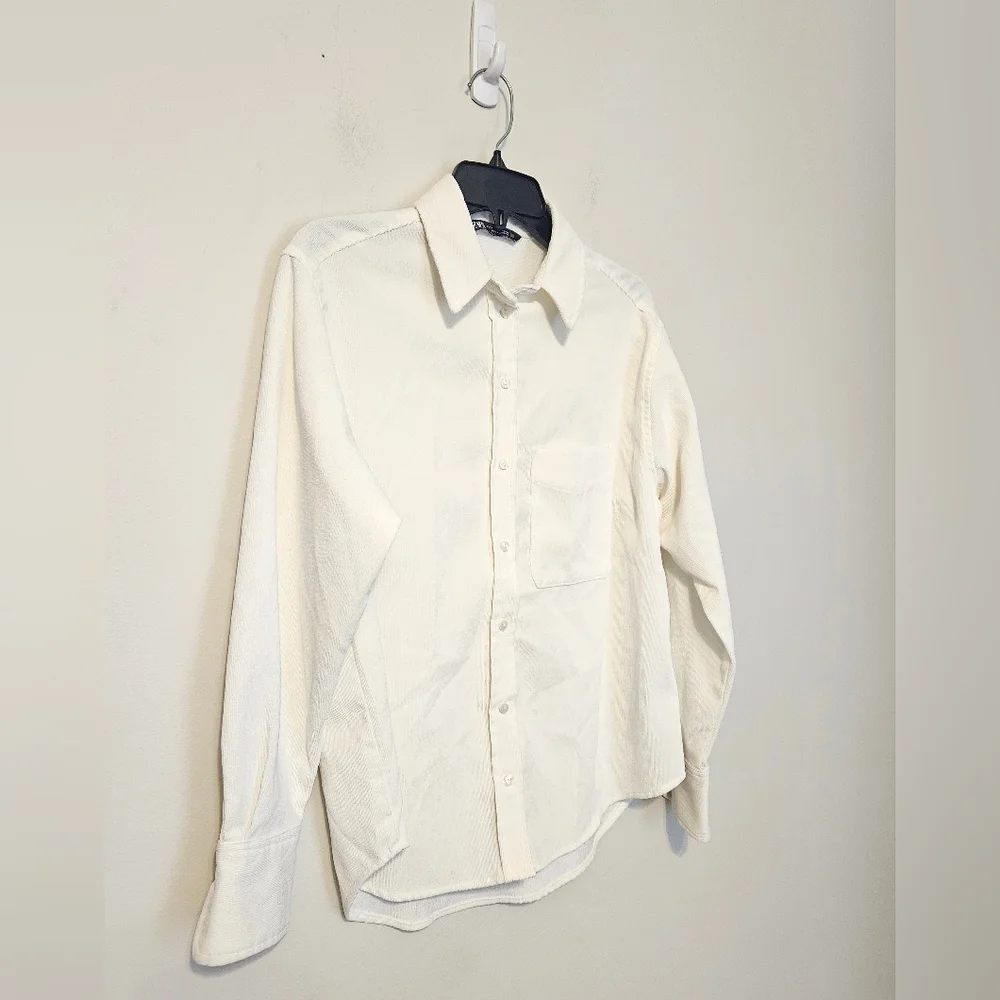 Zara button-up shirt with long sleeves and a single chest pocket